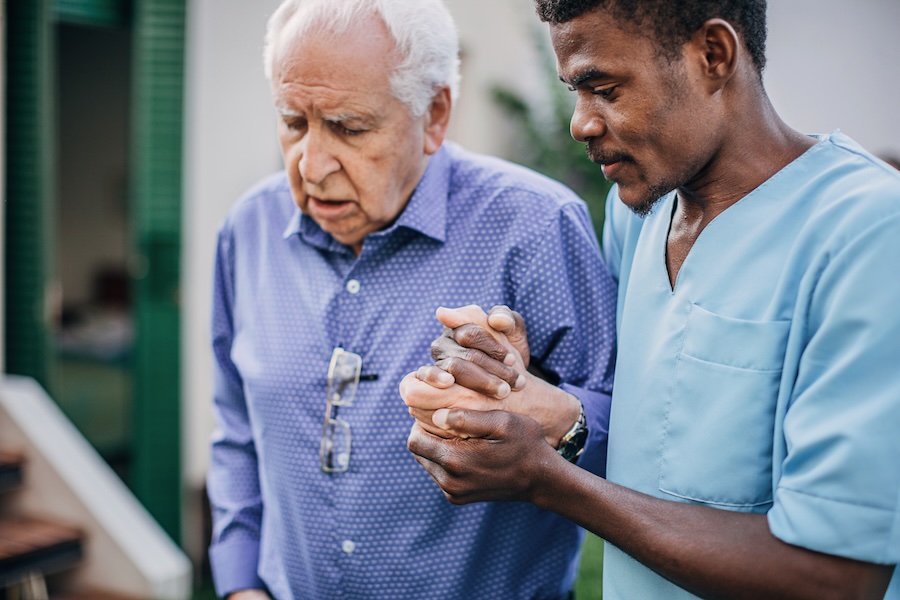 Nurse helping senior